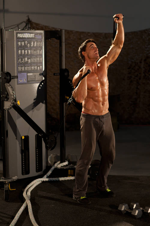 Alternating Cable Shoulder Press, end position