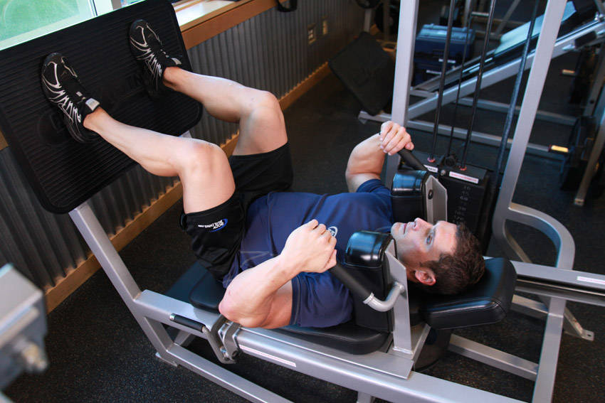 Lying Machine Squat, start position