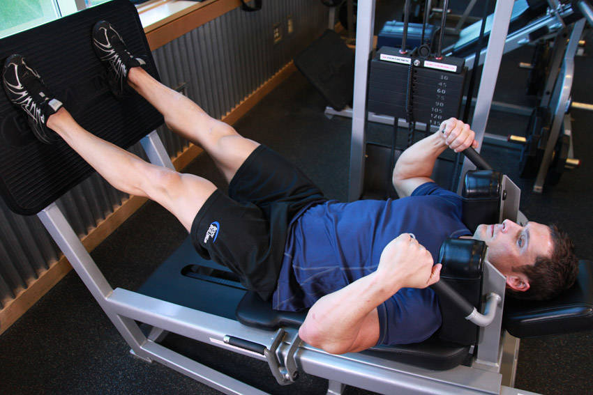 Lying Machine Squat, end position