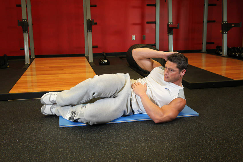 Oblique Crunches - On The Floor, end position