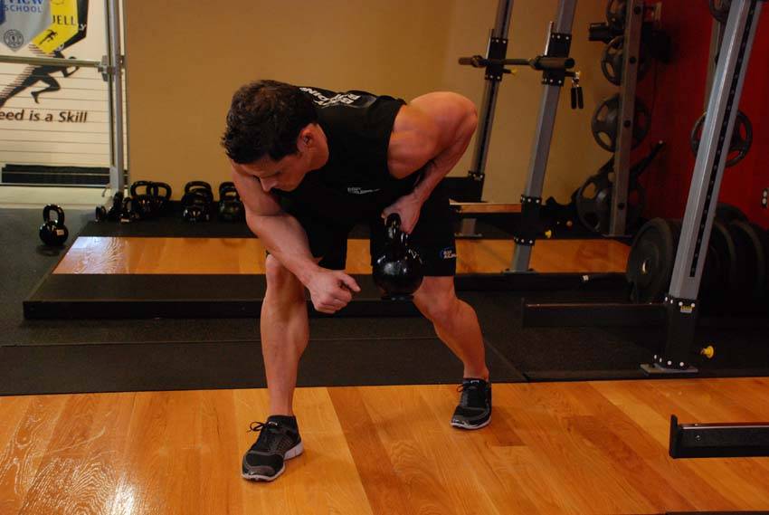 One-Arm Kettlebell Row, end position