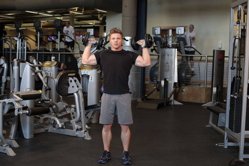 Standing Alternating Dumbbell Press, start position
