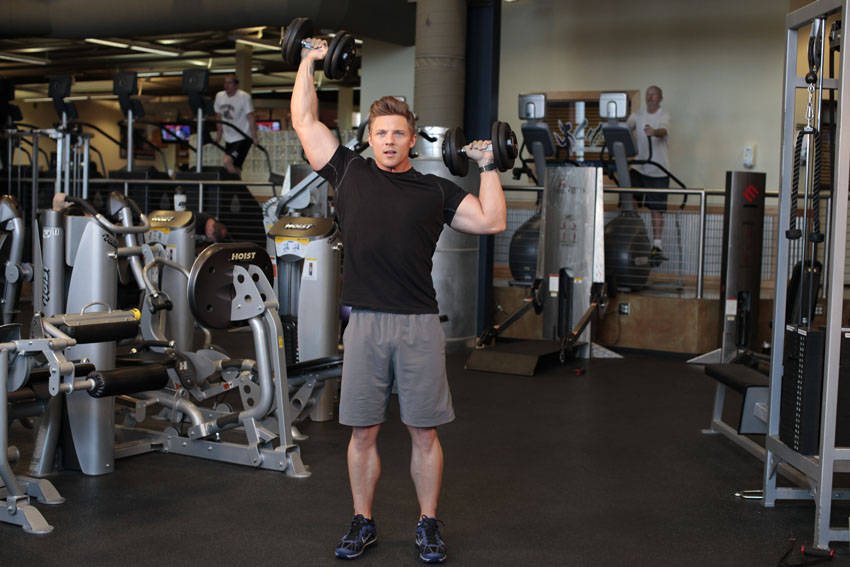 Standing Alternating Dumbbell Press, end position
