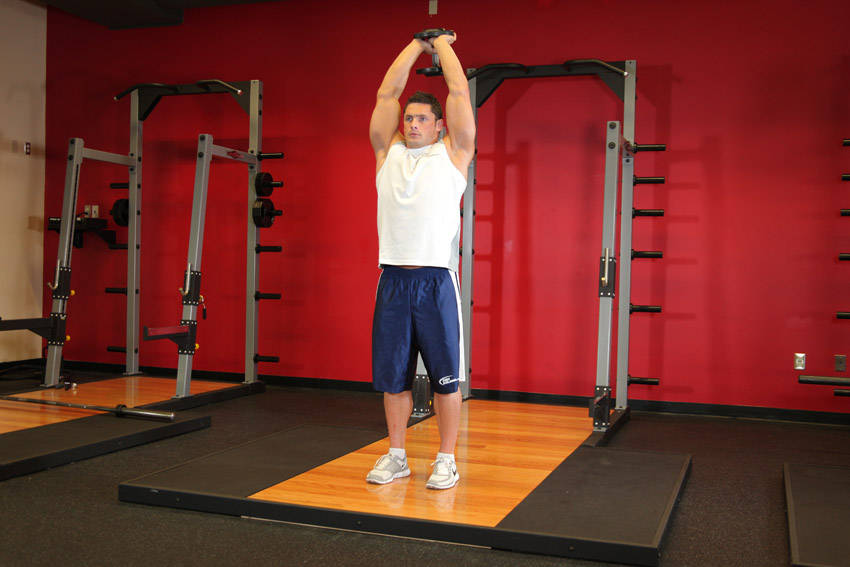 Standing Dumbbell Triceps Extension, start position